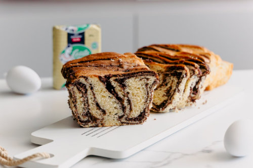 Fluffy cozonacs with cocoa and walnut filling