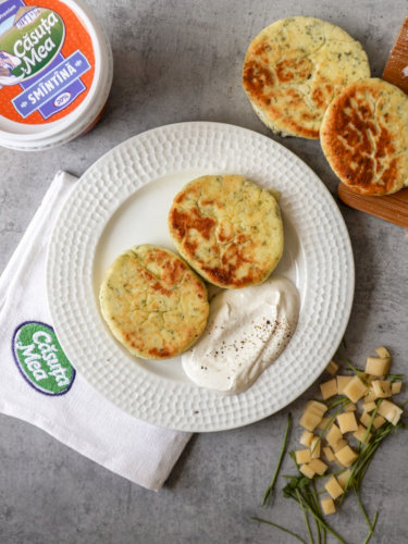 Papanasi with cheese and greens