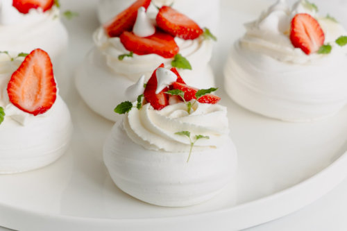 Pavlova with lime and strawberry cream